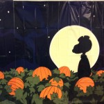 Snoopy in Pumpkin Patch with Moon in Background